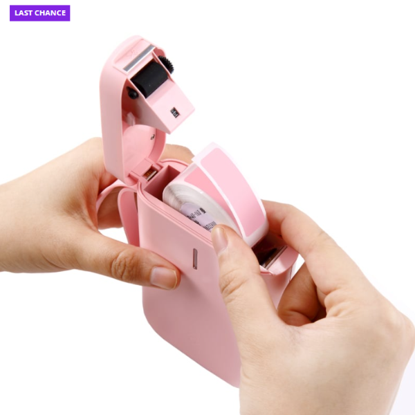 Pink electronic device with a screen held by hands on a white background