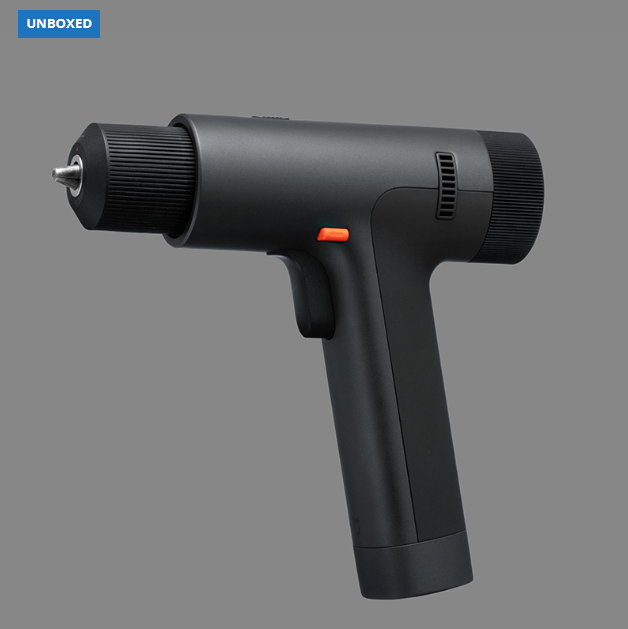 Black hot air gun on a gray background with 'UNBOXED' label.