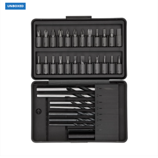 Set of drill bits in an open black case on a white background