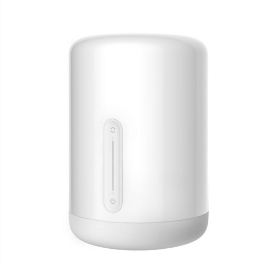 White cylindrical device with a power button on a white background