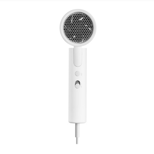 White handheld hair dryer with a black honeycomb pattern on a white background