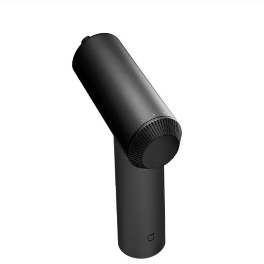 Black handheld vacuum cleaner on a white background