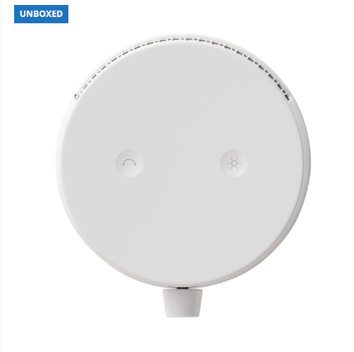 White round device with control buttons on a white background, branded 'UNBOXED'.