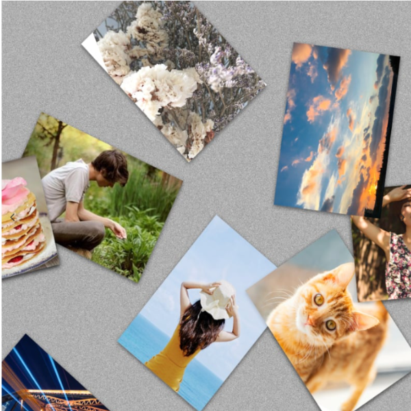 Collection of various photo prints on a textured surface