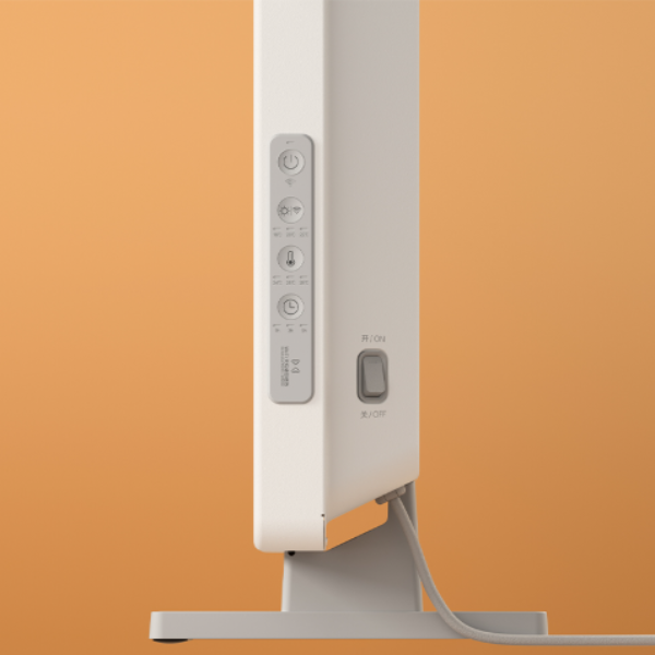 White electronic device with control panel on an orange background