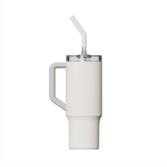 White tumbler with a straw on a white background