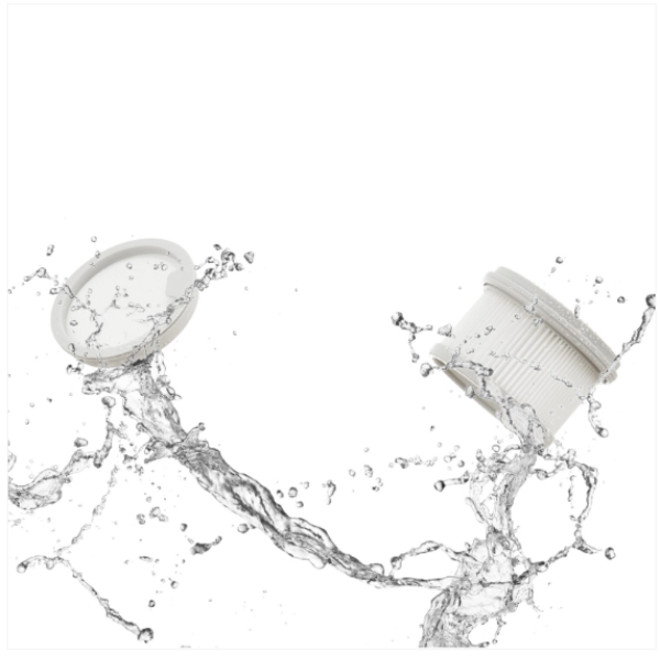 Two white cylindrical objects with water splashes on a white background