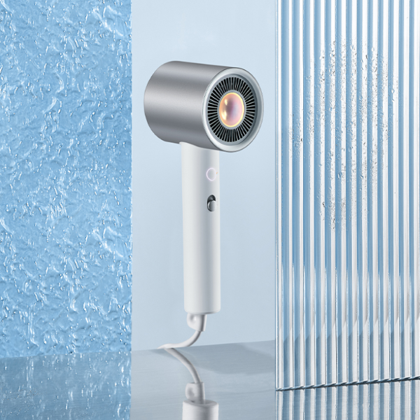Hair dryer against a shower background