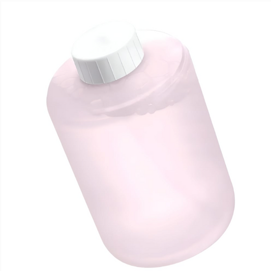 Pink bottle with a white cap on a white background