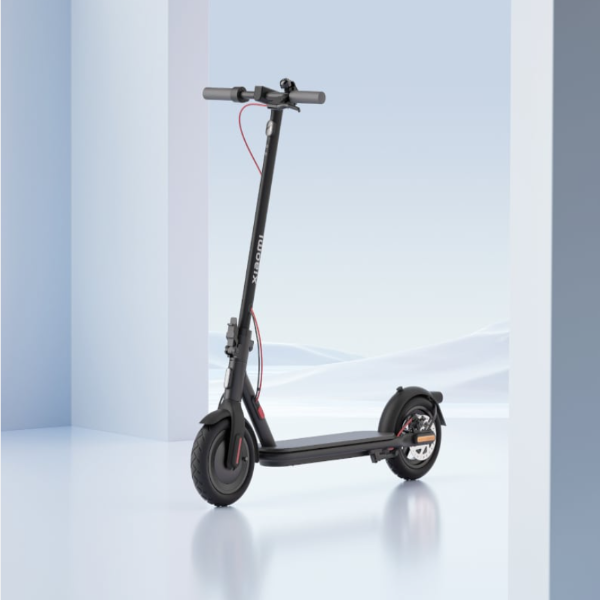 Black electric scooter on a reflective surface with a light blue gradient background