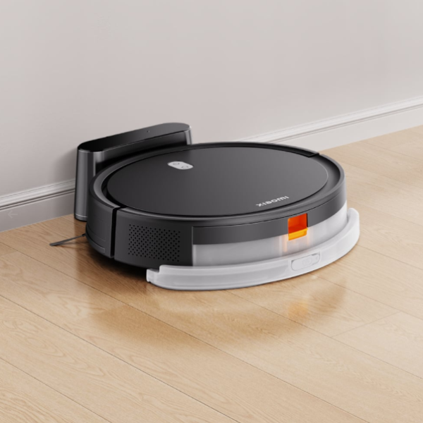 Robotic vacuum cleaner on a wooden floor
