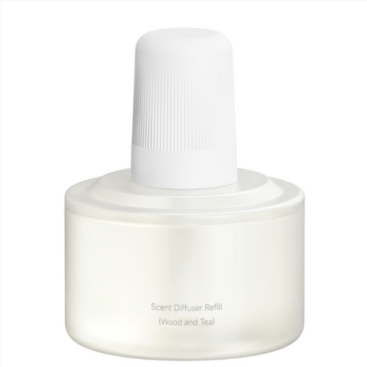 White scent diffuser refill bottle on a white background