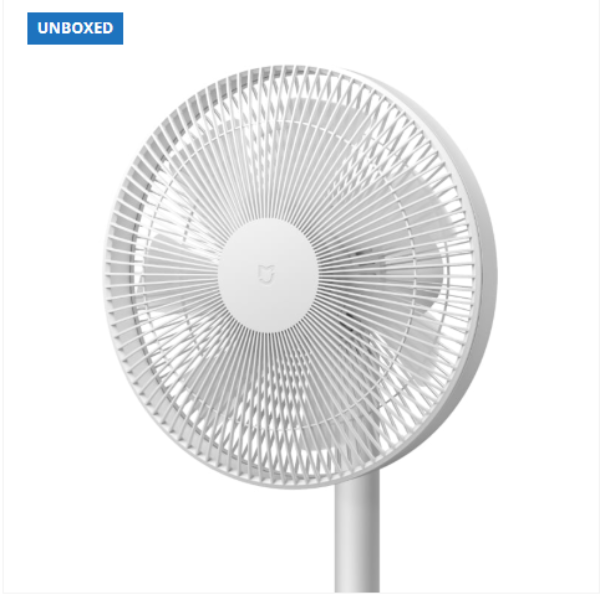 White oscillating table fan on a white background with 'UNBOXED' label.