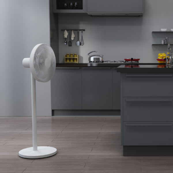White standing fan in a modern kitchen setting