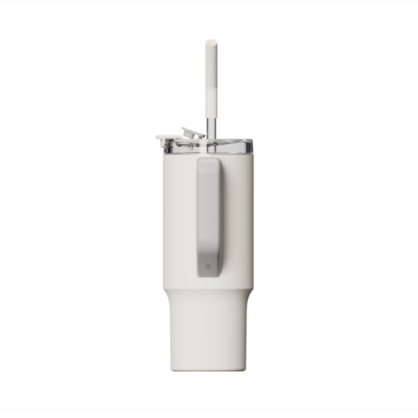 White tumbler with a straw on a white background