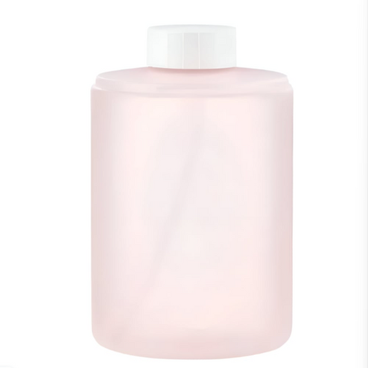Pink cylindrical container with a white cap on a white background